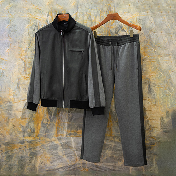 dolce & gabbana two‑tone spliced jacket and trousers set